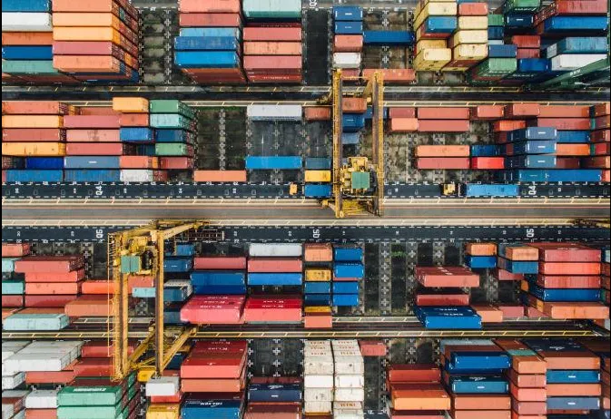 Export shipping containers stacked at port